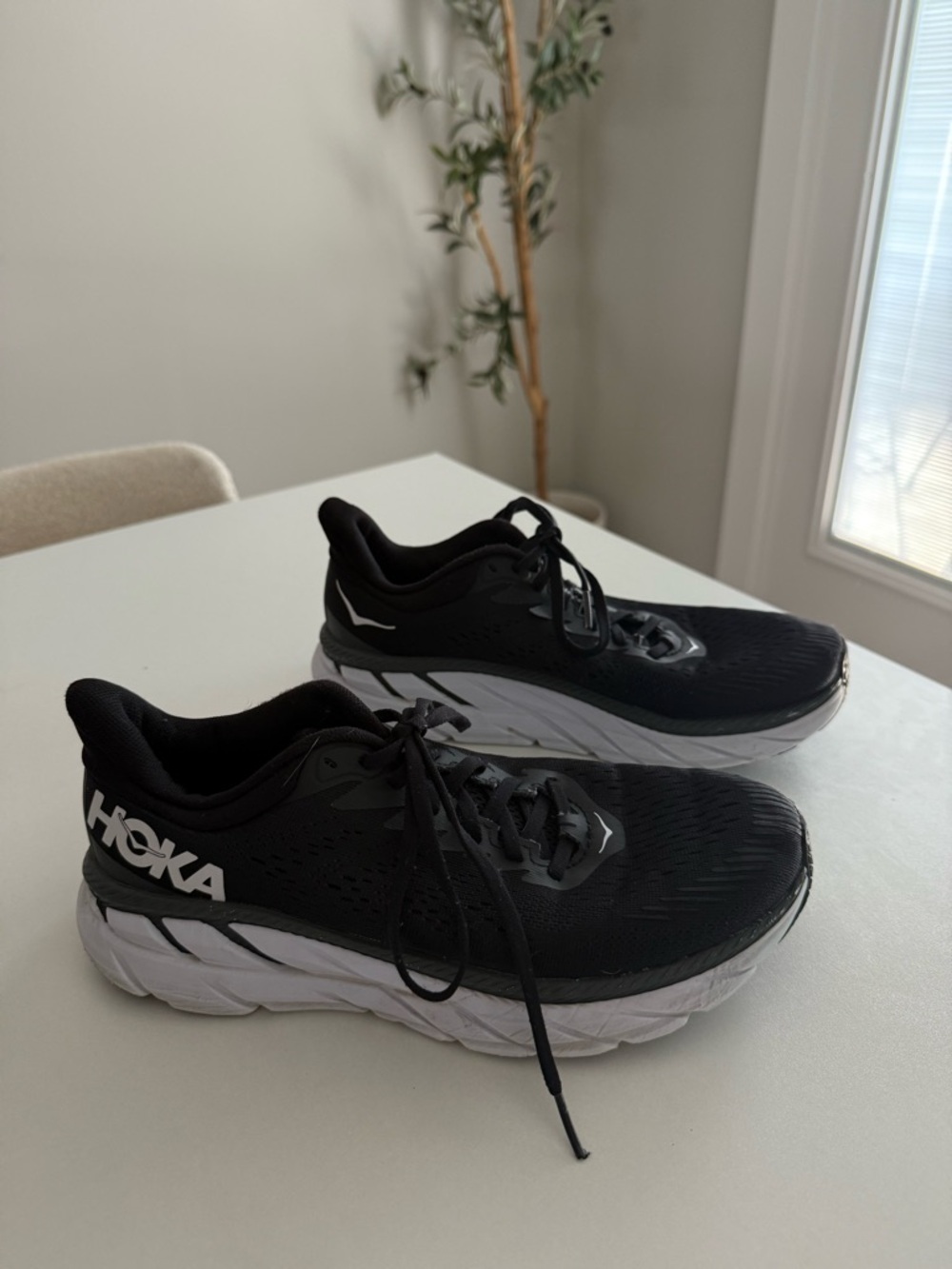 Hoka Black and White Athletic Running Shoes